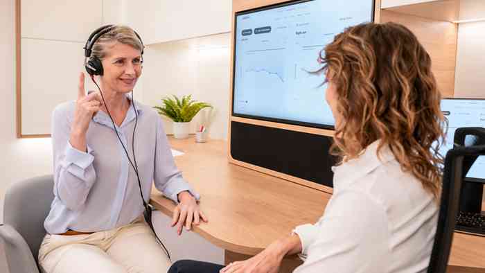 woman performing a hearing test
