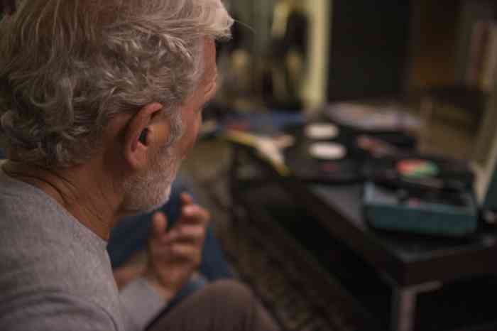 A Grandpa listening to the music