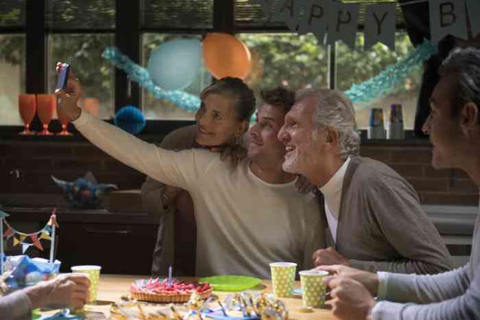 A woman is going surfing wearing her hearing aid