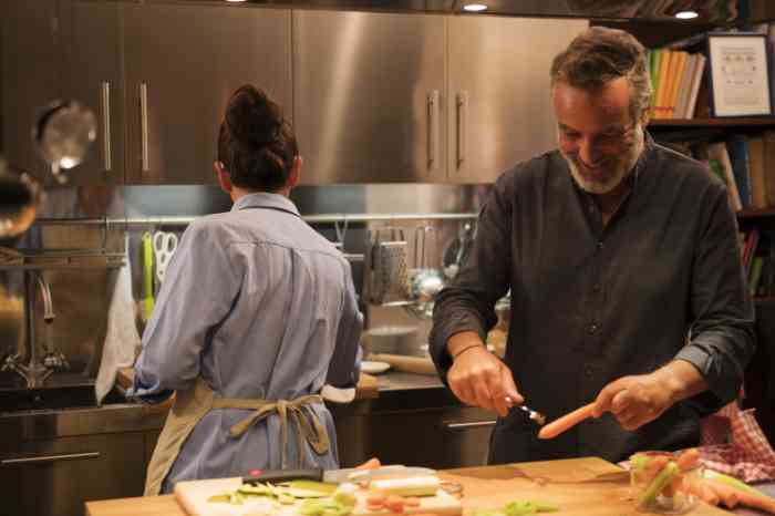 A couple cooking together