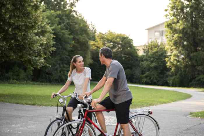 couple riding bicycles together.