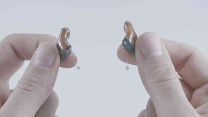 place hearing aids in the ear