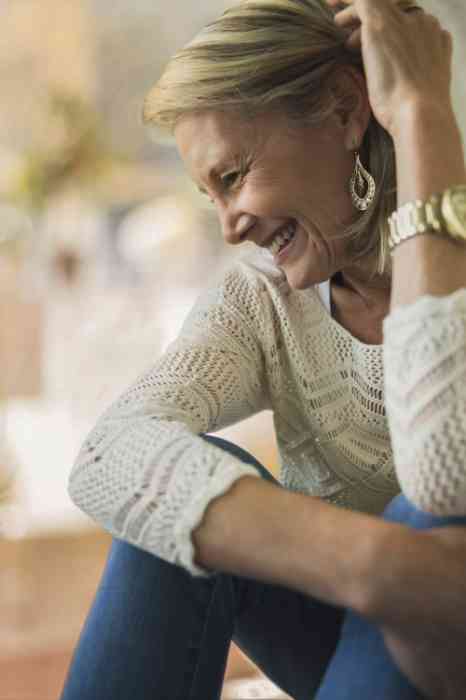 A man and a woman walking and laughing together