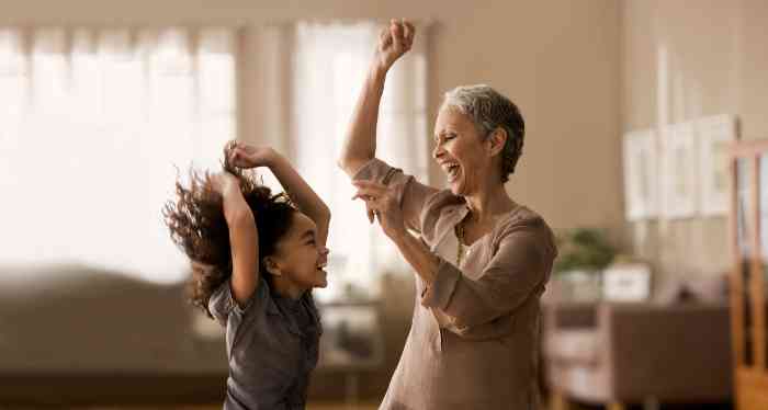 grandmother and grandchild dancing.