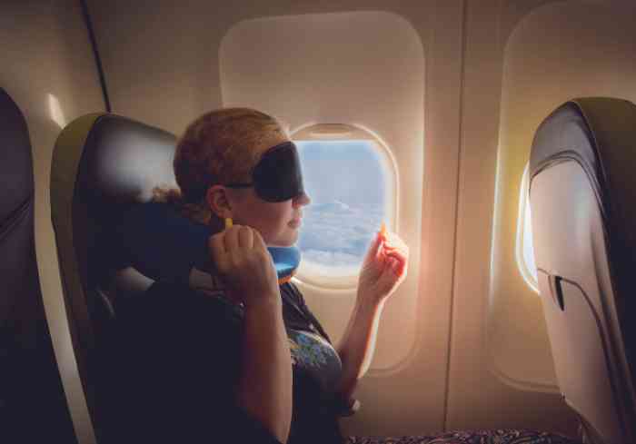 A woman sitting on a plane